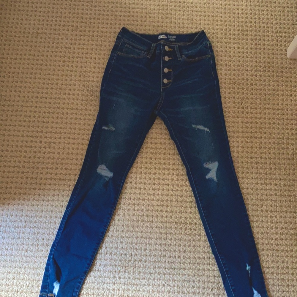 I am selling never worn high waisted ripped jeans